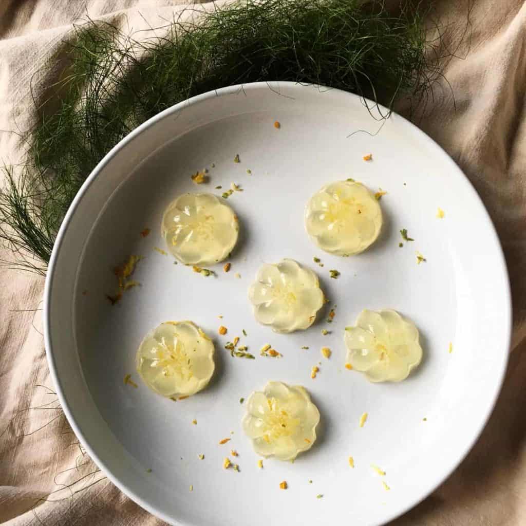 5 pieces of yuzu marmalade konnayku jelly on a plate