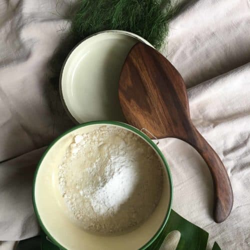 Homemade cake flour substitute in a metal bowl