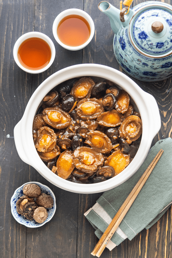 A pot of abalone braised with shiitake mushrooms, a lucky dish for a prosperous Chinese New Year