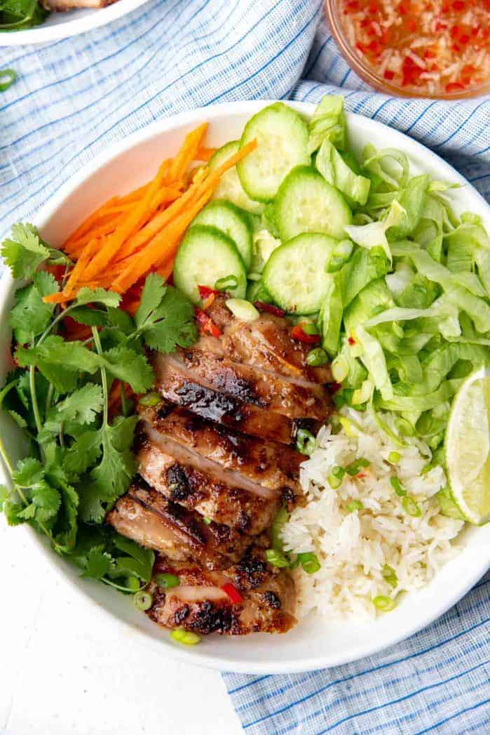 A bowl of lemongrass grilled chicken with vegetables