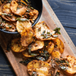 A platter of crispy homemade potato chips cooked in salted egg