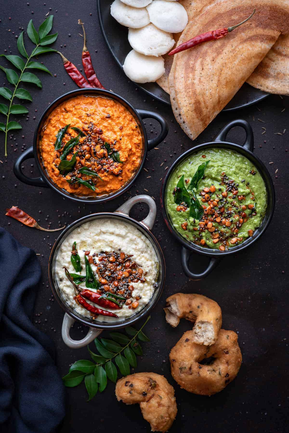 3 bowls of different indian chutneys