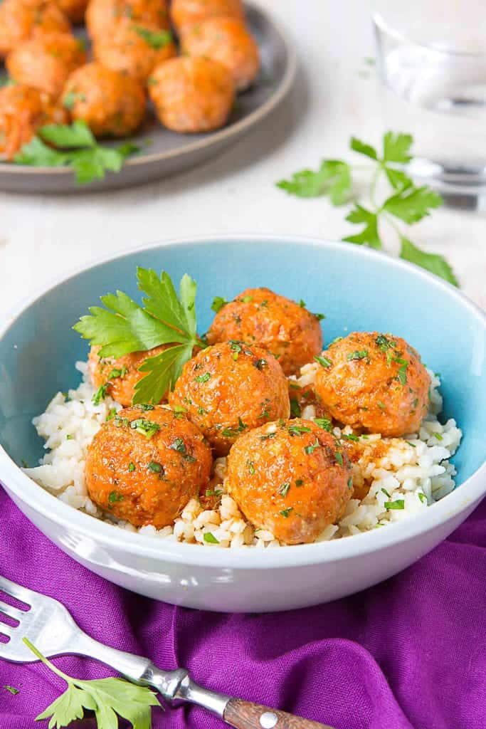 Bowl of rice with soy and 5 spice powder salmon meatballs