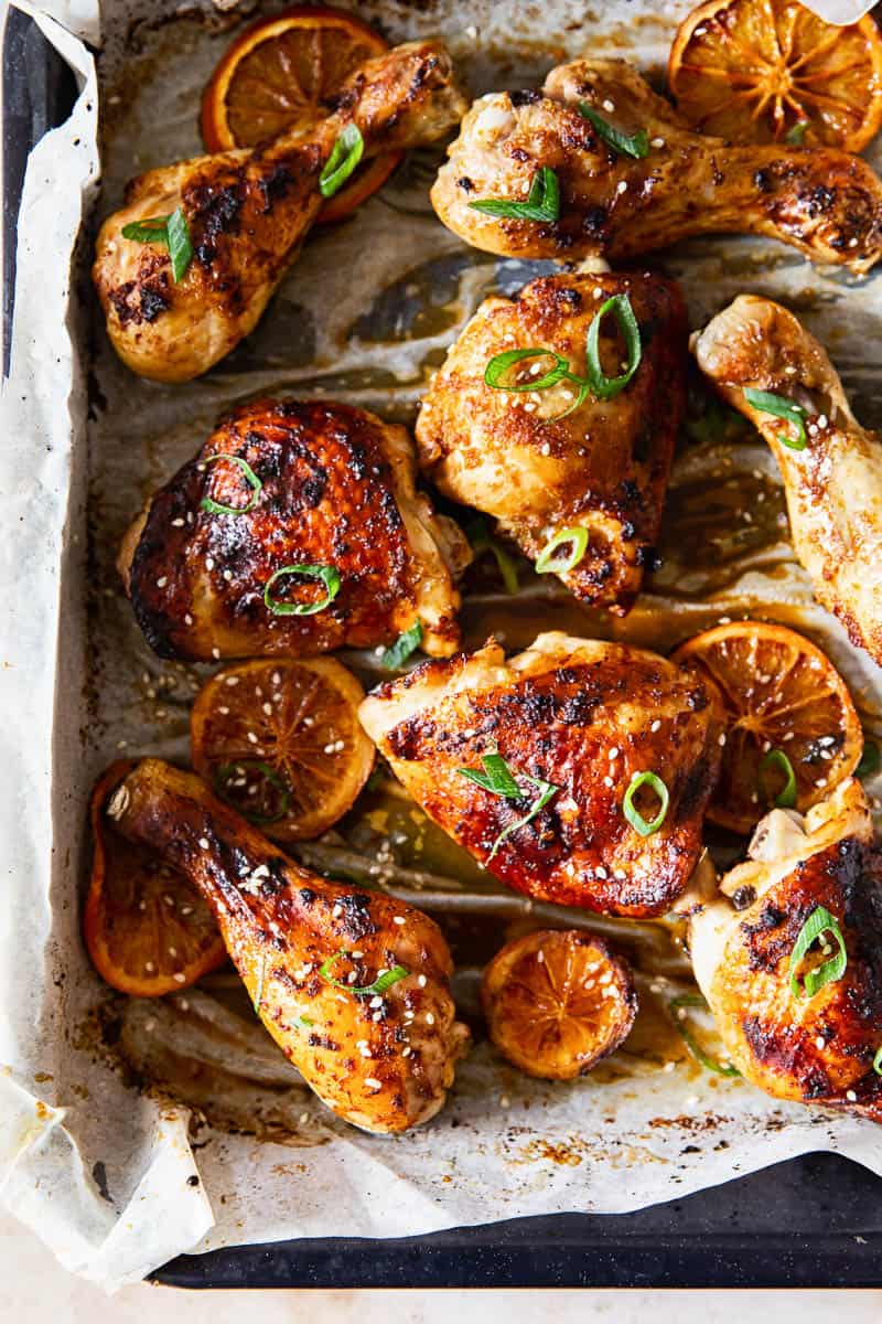 A platter of chicken thighs marinated with honey, soy and 5 spice powder