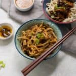 A bowl of vegan dan dan mian noodles made with 5 spice powder