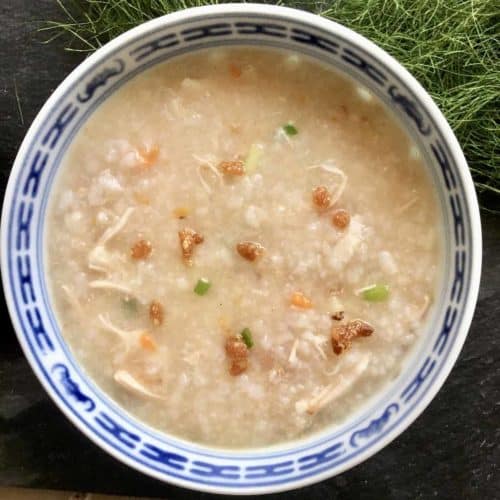 A close-up of a bowl of chicken congee