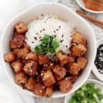 A vegan bowl of rice with hoisin baked tofu