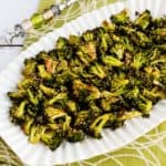 A platter of oven roasted broccoli in soy and sesame