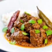 Close-up of achar gosht lamb curry.