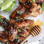Chicken wings grilled in a honey and sriracha sauce