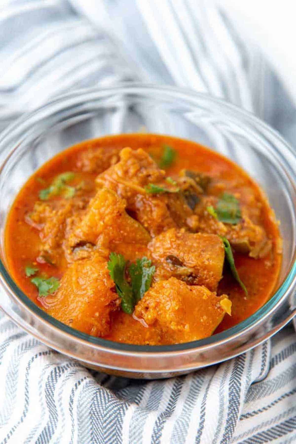 Bowl or orange Sri Lankan pumpkin curry.