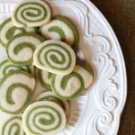 A plate of white and green swirled cookies, made using green tea.