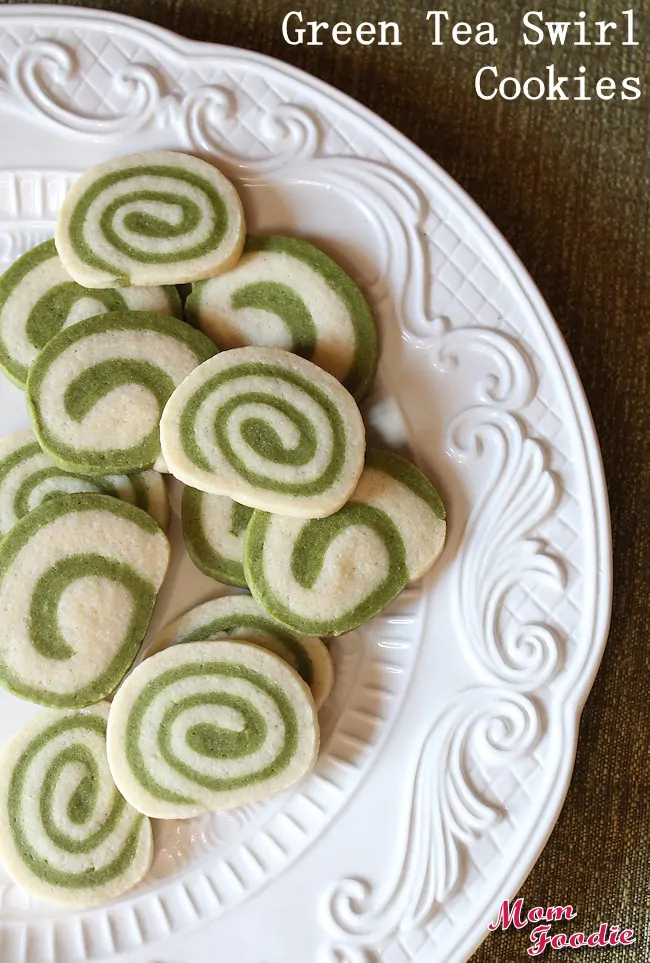 A plate of white and green swirled cookies, made using green tea.