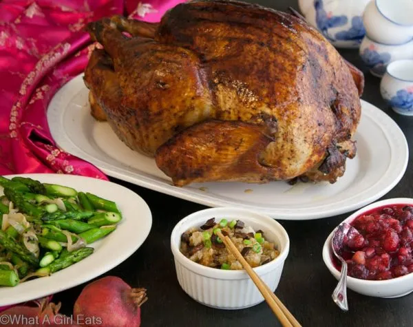 A table of Christmas dishes, including Asian Roast Turkey