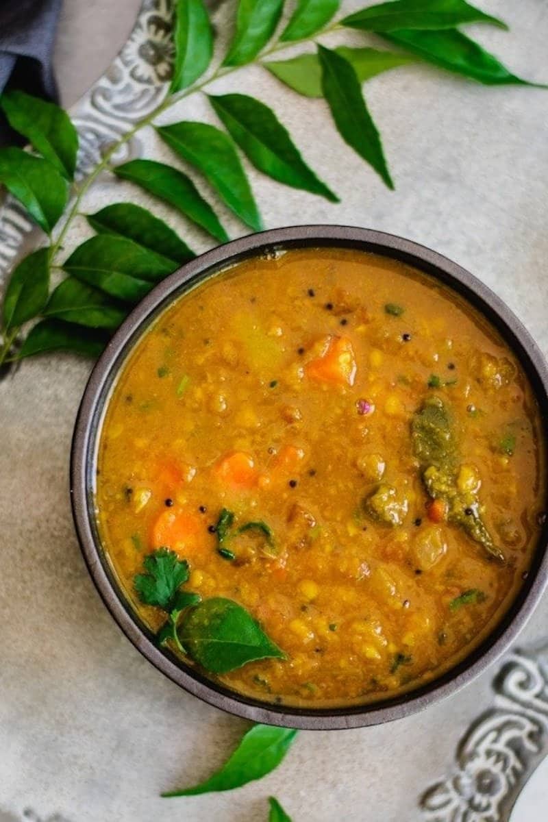 Tamarind and lentil sambar in a bowl.