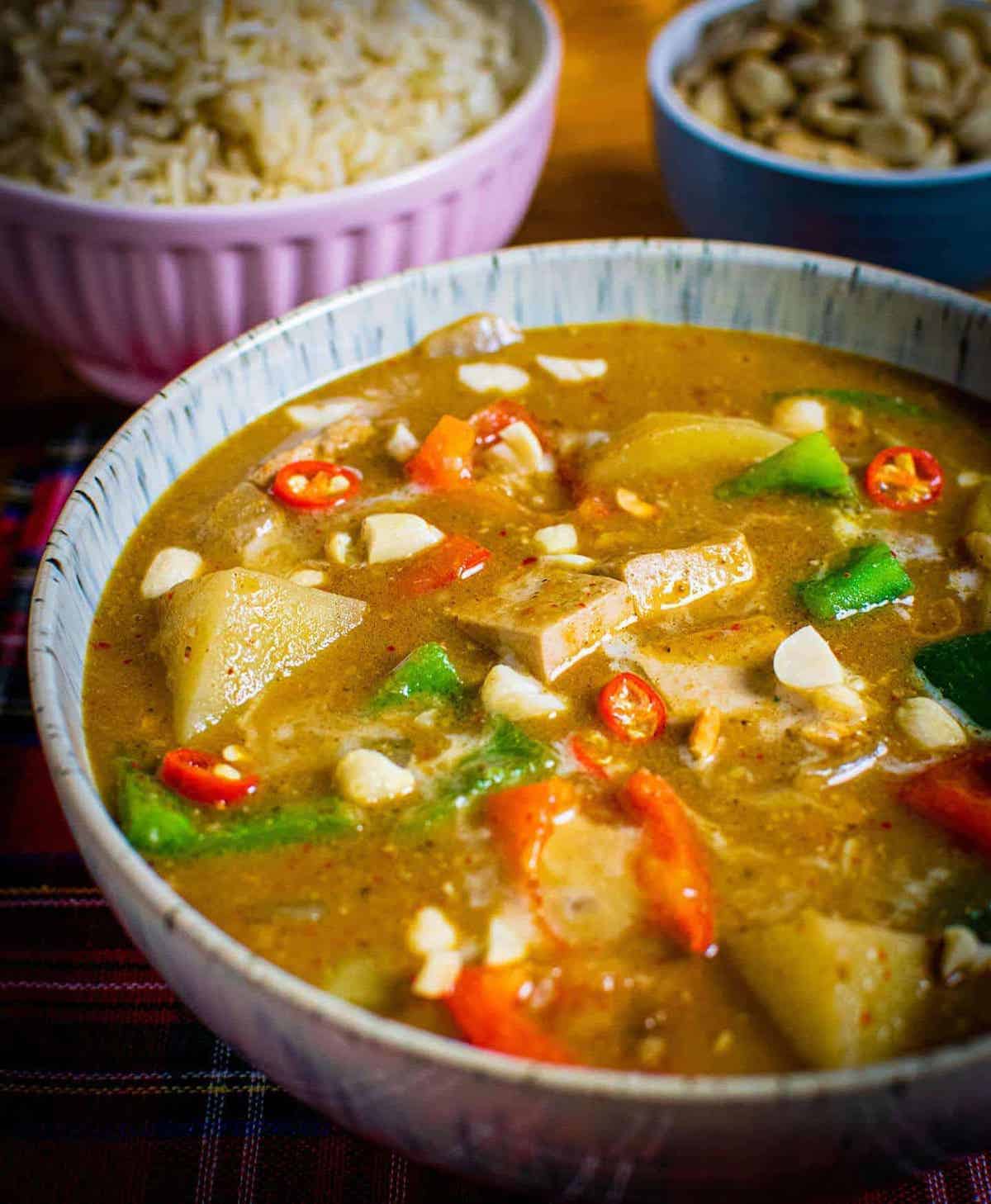 Close-up of a bowl of Thai Massaman curry.