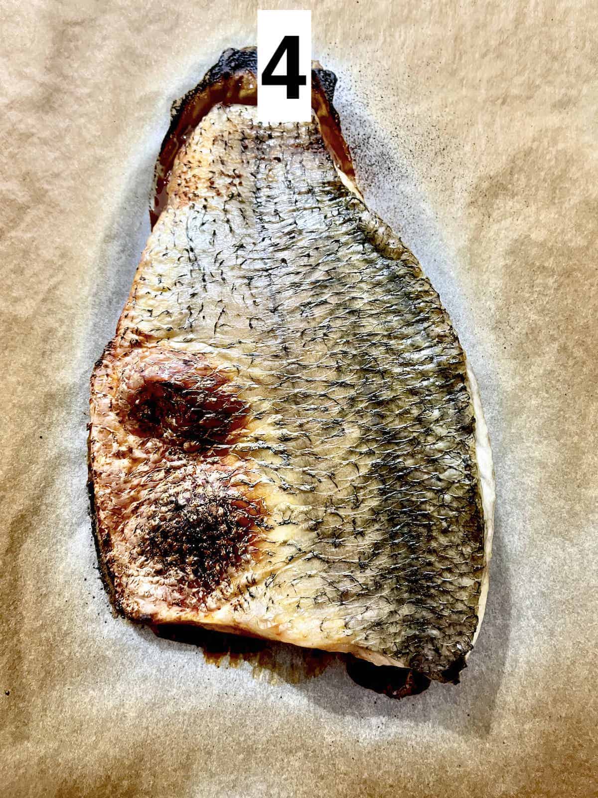 Broiled sea bass with nice blistered skin.