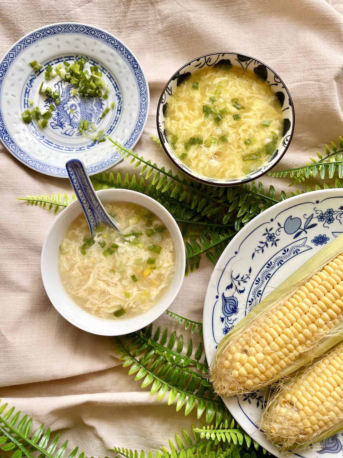 2 bowls of egg drop corn soup, 1 with turmeric and 1 without.