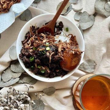 Close-up of braised minced pork with crispy shallots.