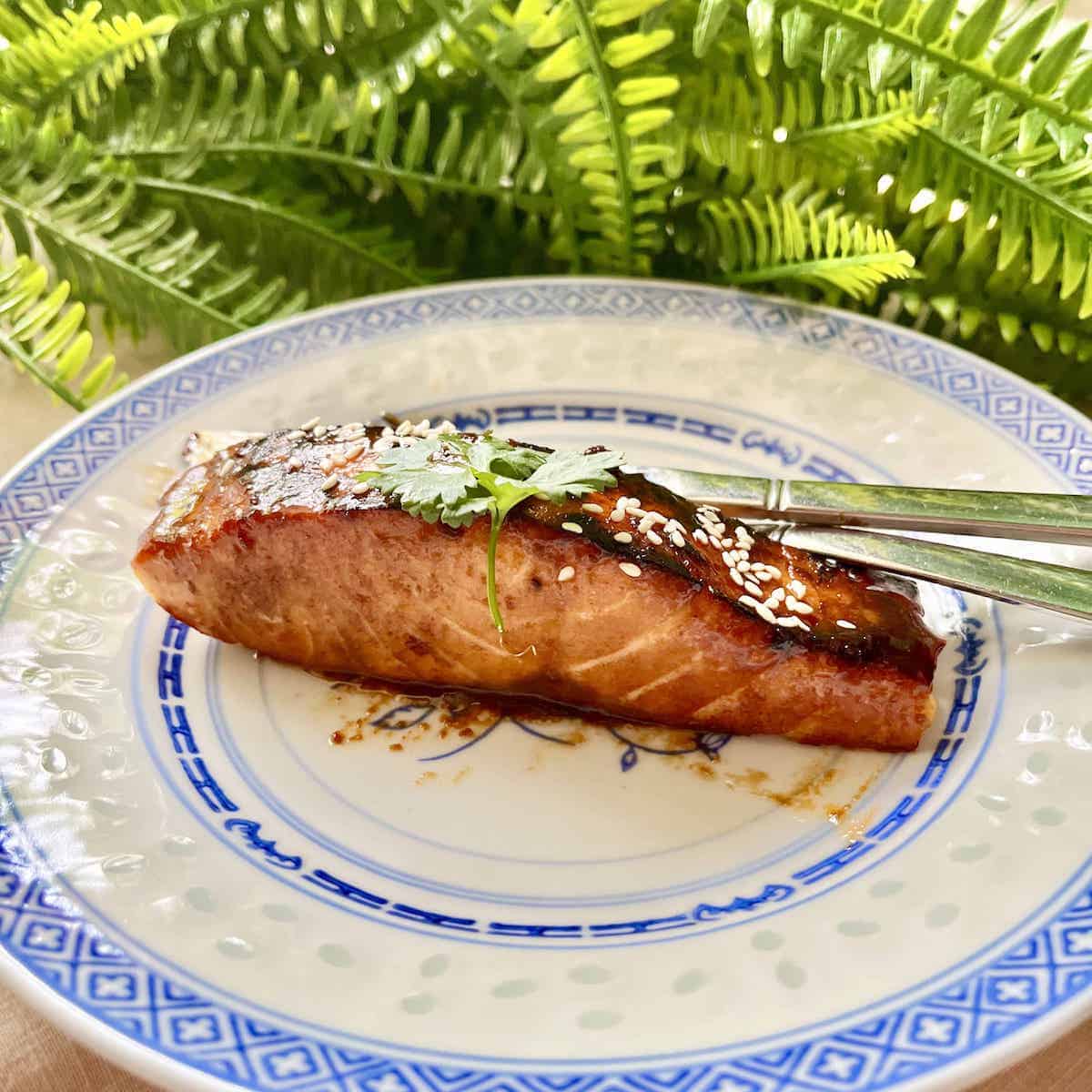 Miso Butter Salmon Fillet on a blue and white plate.