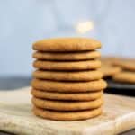 A pile of Icelandic pepper cookies or piparkoku on a tile against a blue background that looks like the skyr