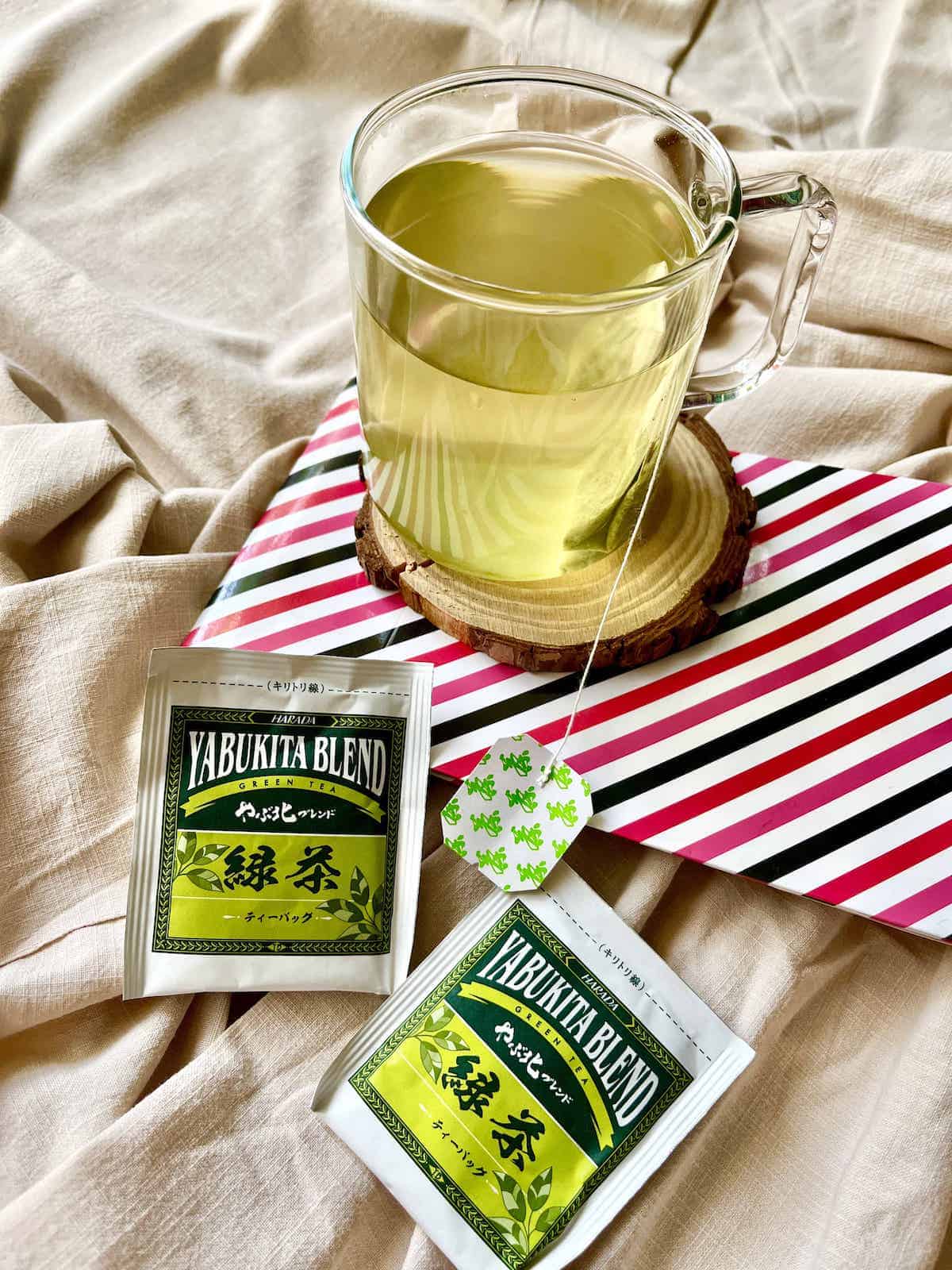 A cup of green tea made from a Japanese tea bag.