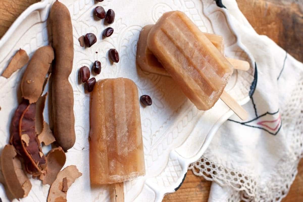 Tamarind ice popsicles on a white cloth.