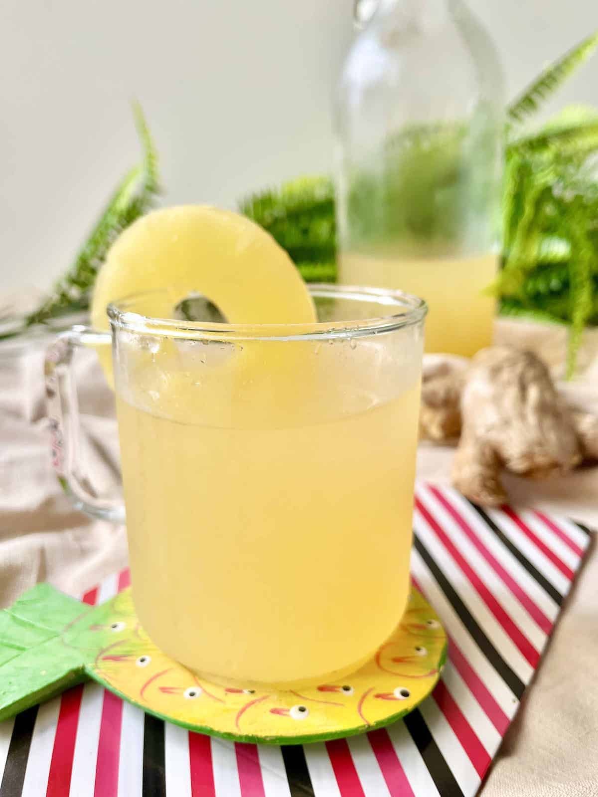 A cup of homemade ginger pineapple soda.