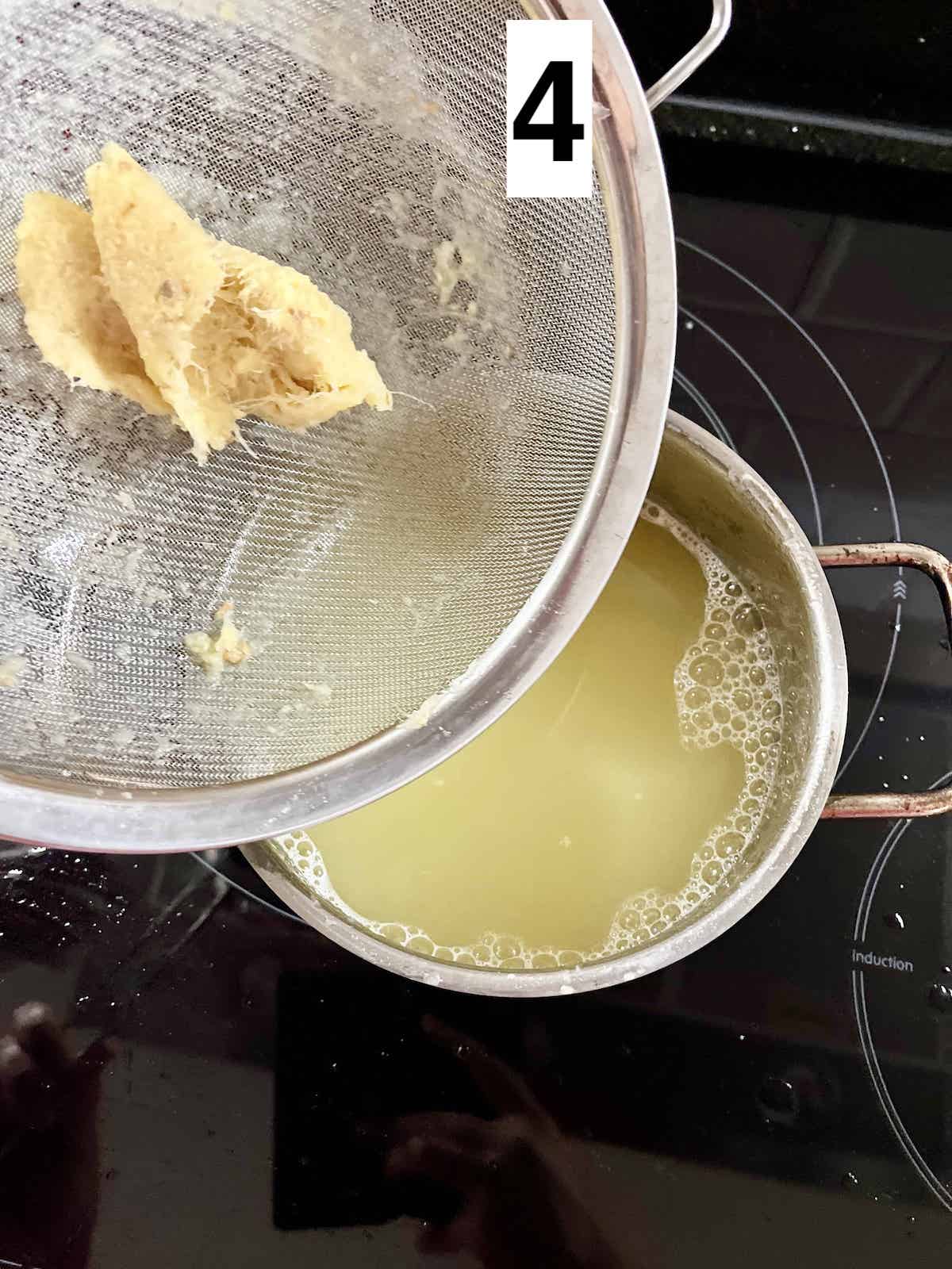 Bringing strained pineapple ginger juice to the boil.