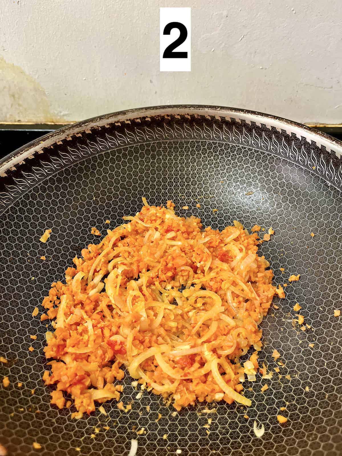 Stir-fried onions and carrots in a chili-garlic paste.