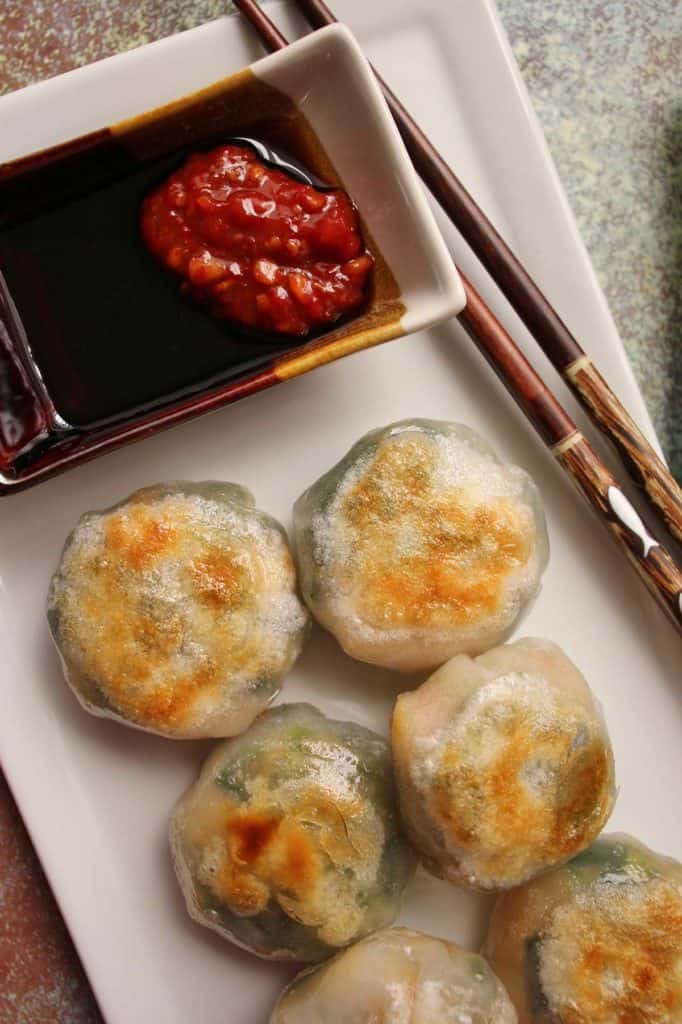 6 crystal chive dumplings on a platter