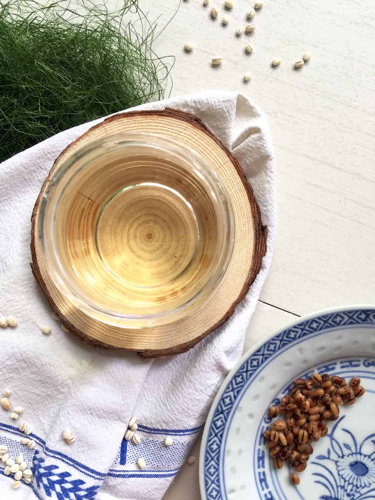 Cup of golden home roasted barley tea, also known as boricha, mugicha and damaicha