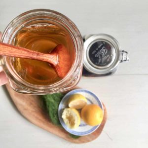 A top view of a glass of Asian plum tea