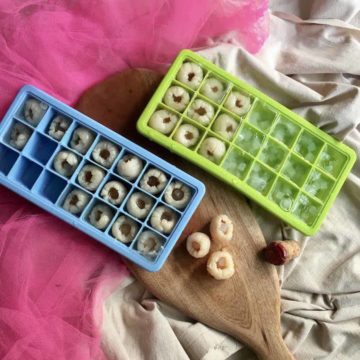 Champagne lychee konnyaku jellies on a serving board and in an ice mold.