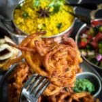 A fork picking up an onion bhaji