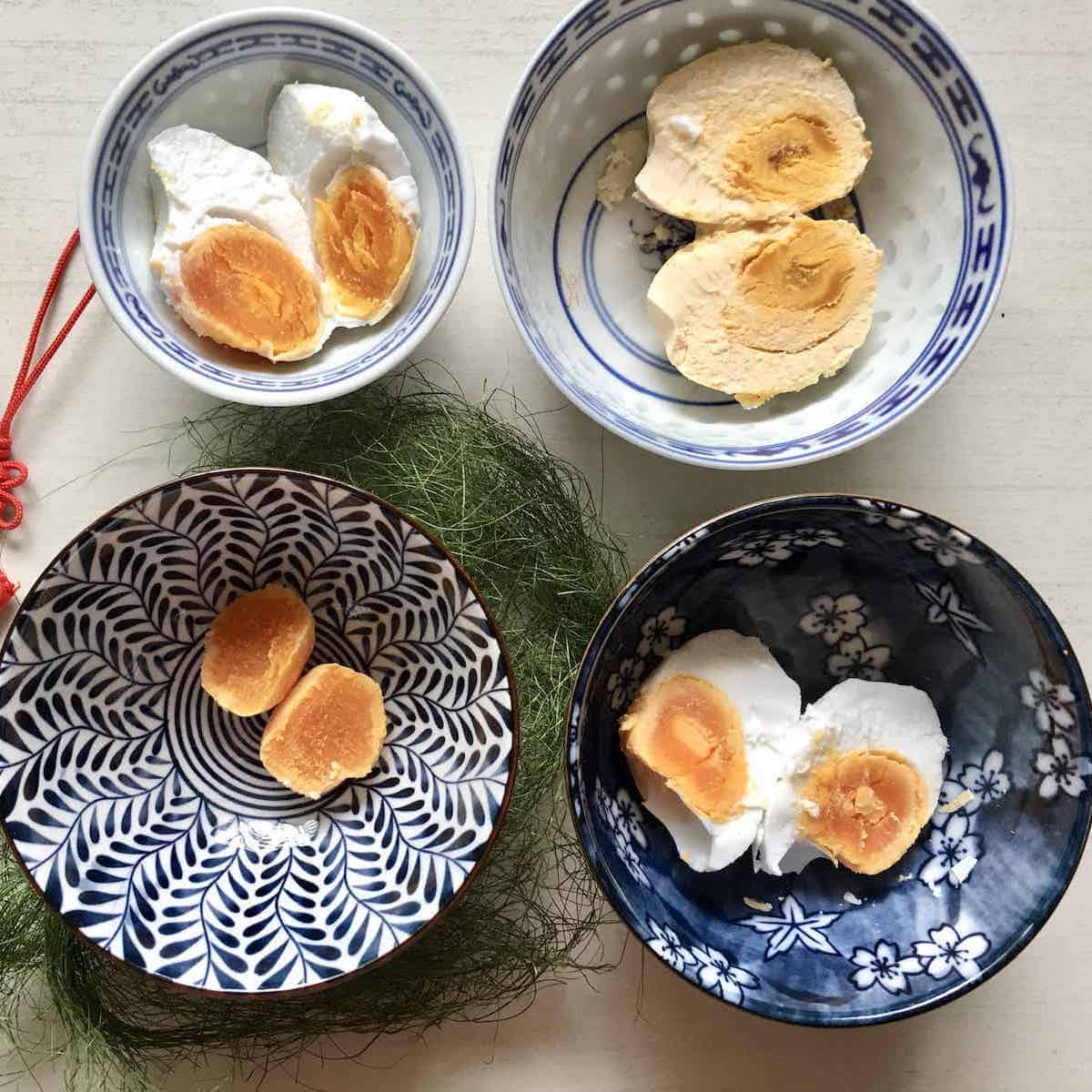 4 salted eggs cut into halves, 2 steamed and 2 boiled