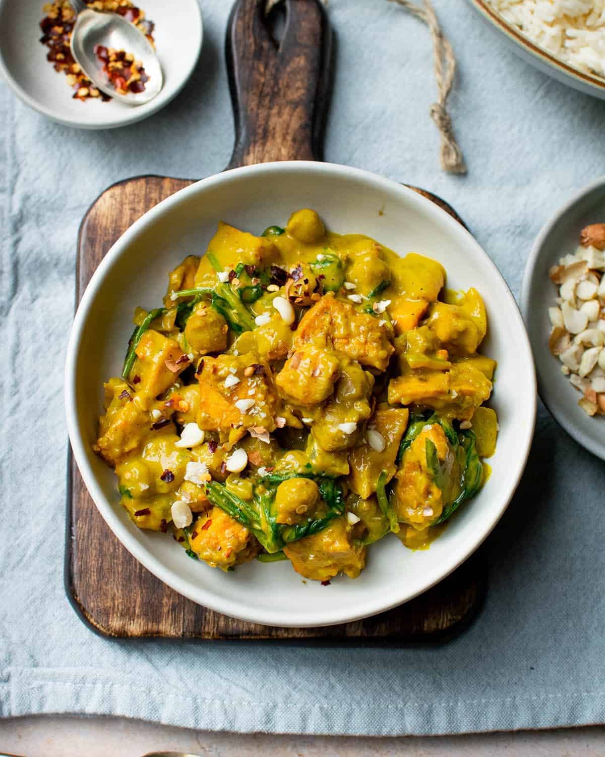 A plate of sweet potato curry with a Indonesian-inspired sauce