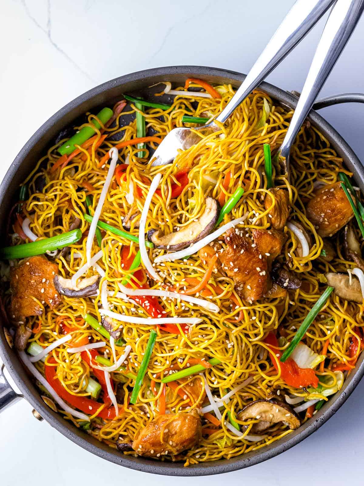 Big pan of stir fried chicken chow mein