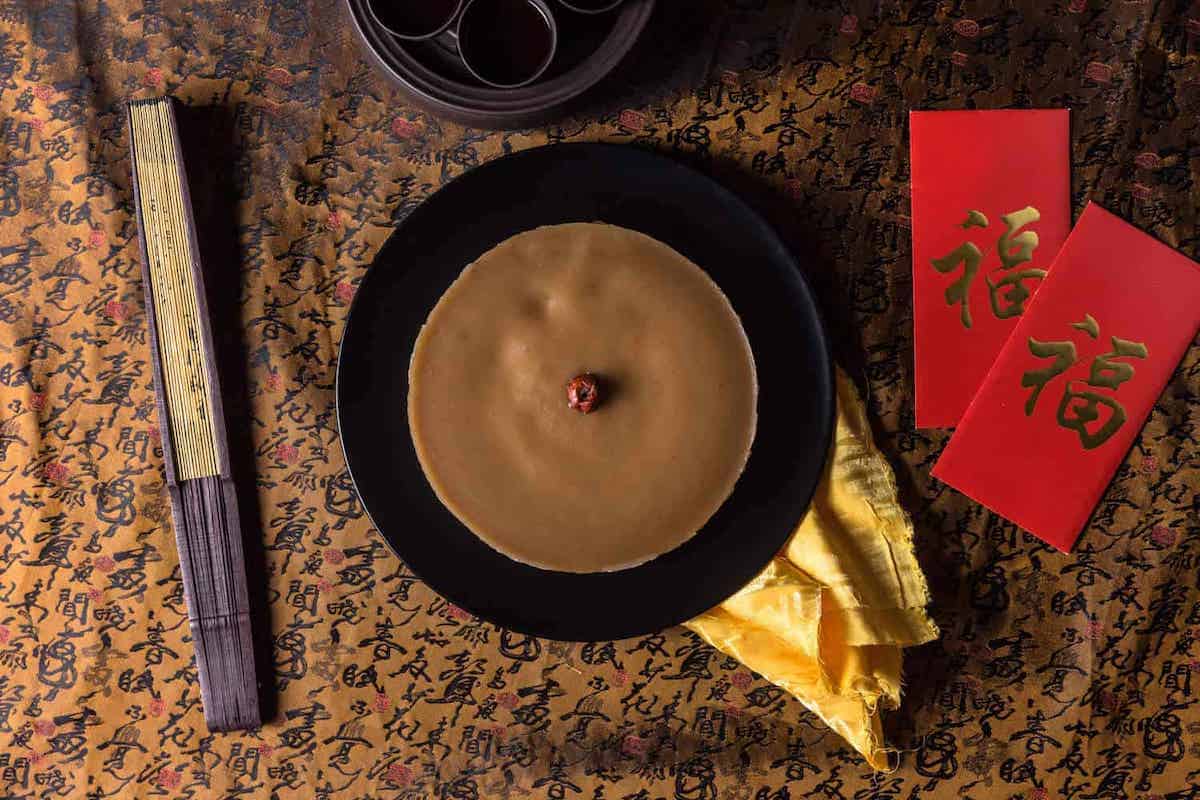 A Chinese New Year table with Nian Gao in the centre