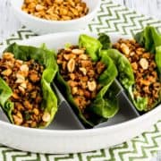 3 lettuce cups filled with ground turkey and mushrooms.