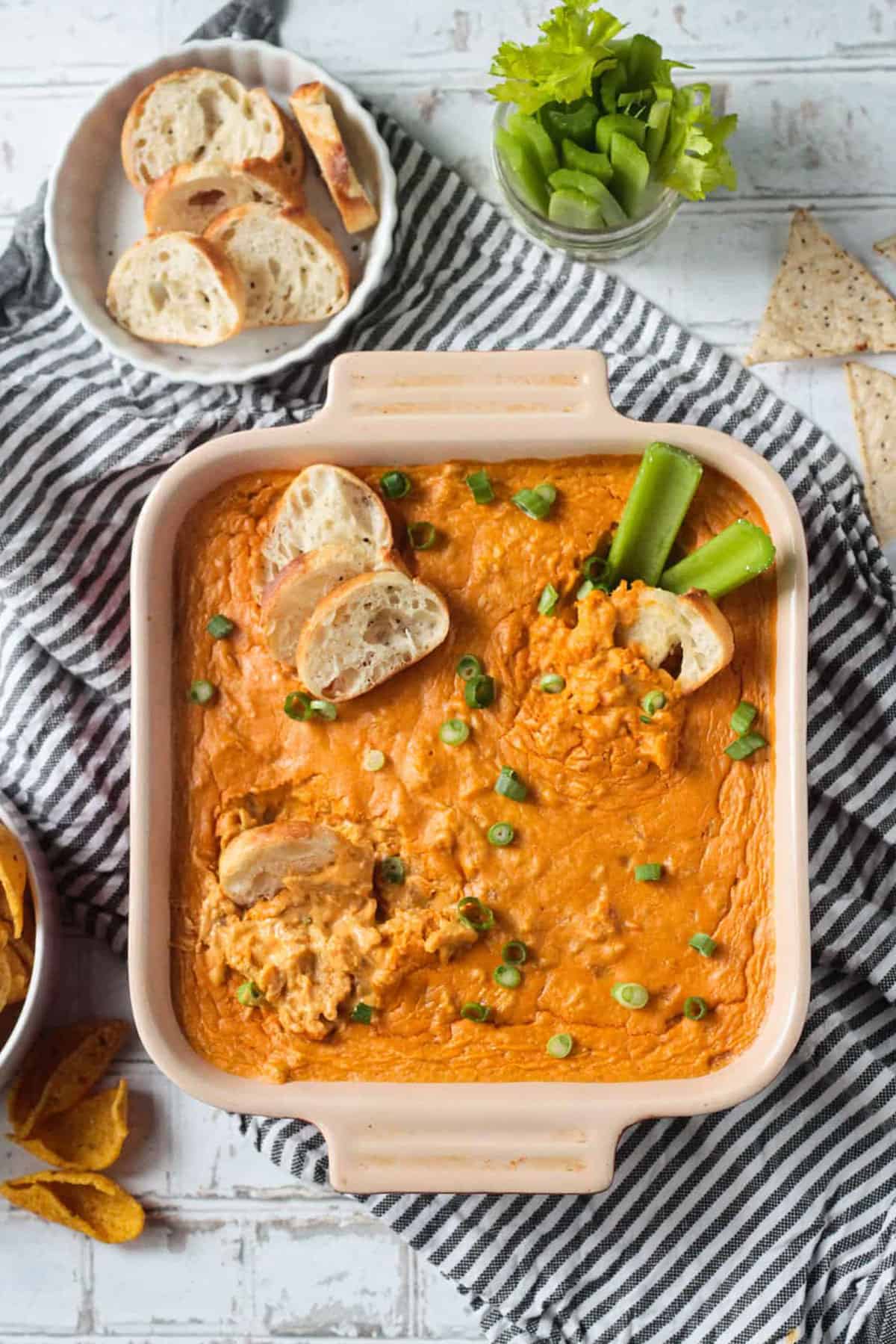 A big tray of orange vegan buffalo chicken dip