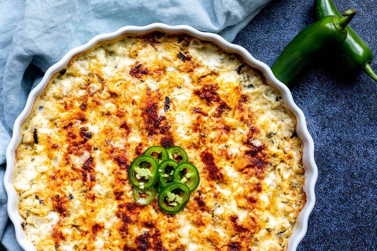 Close-up of a yellow gluten-free dip made from jalapenos and artichokes