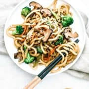 A plate of stir-fried Japanese udon noodles.