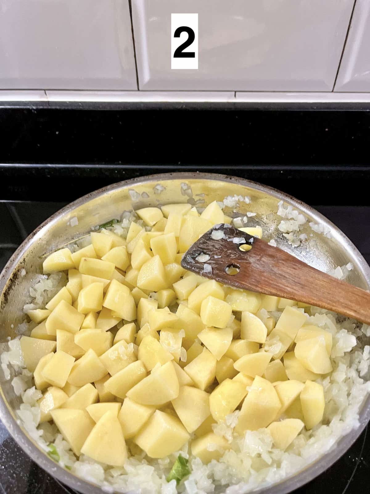 Sauteeing potato and onions.