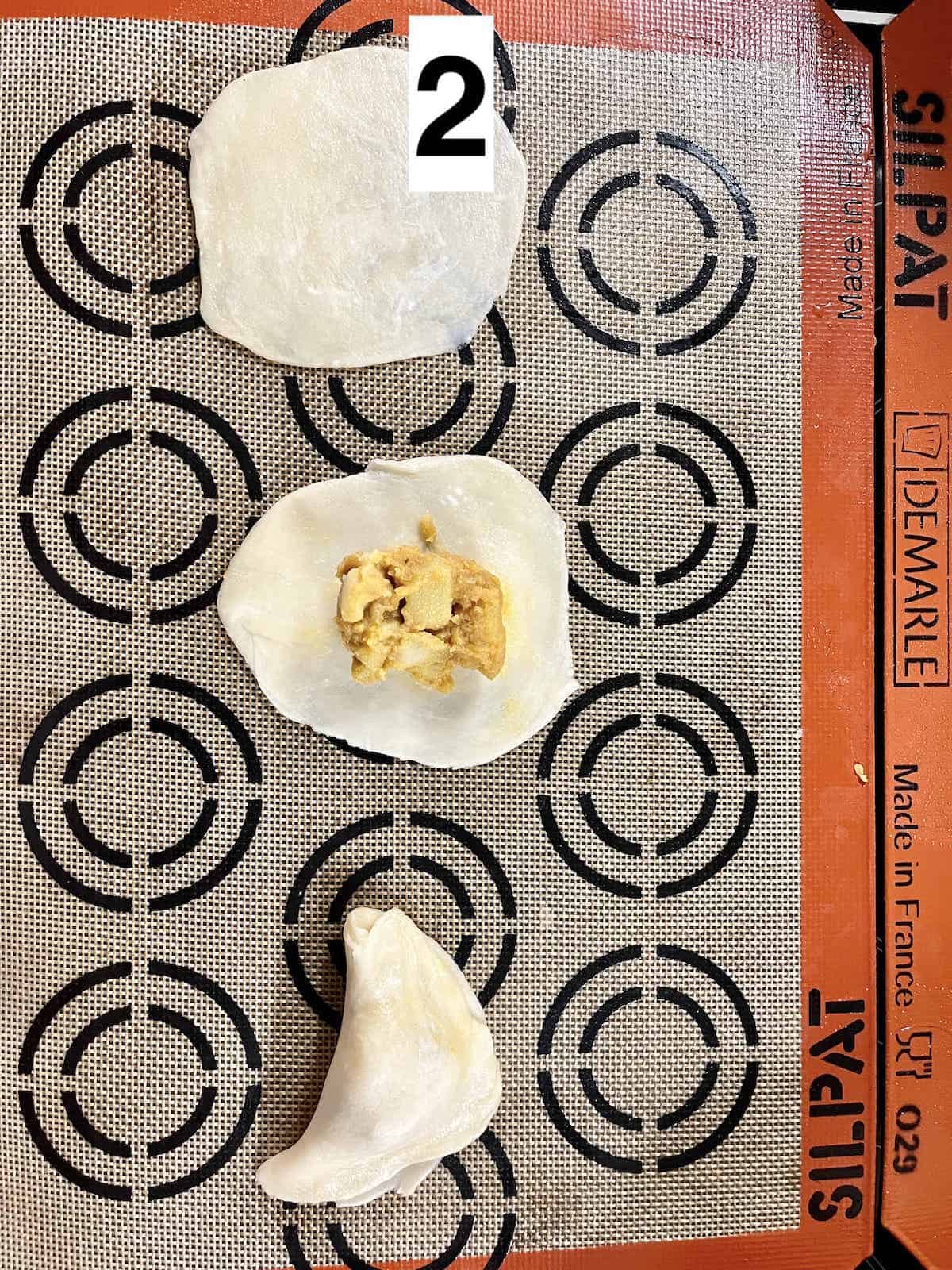 3 pieces of dough, in various stages of curry puff preparation.