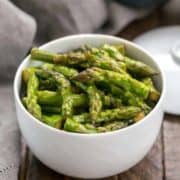 A bowl of stir-fried asparagus.