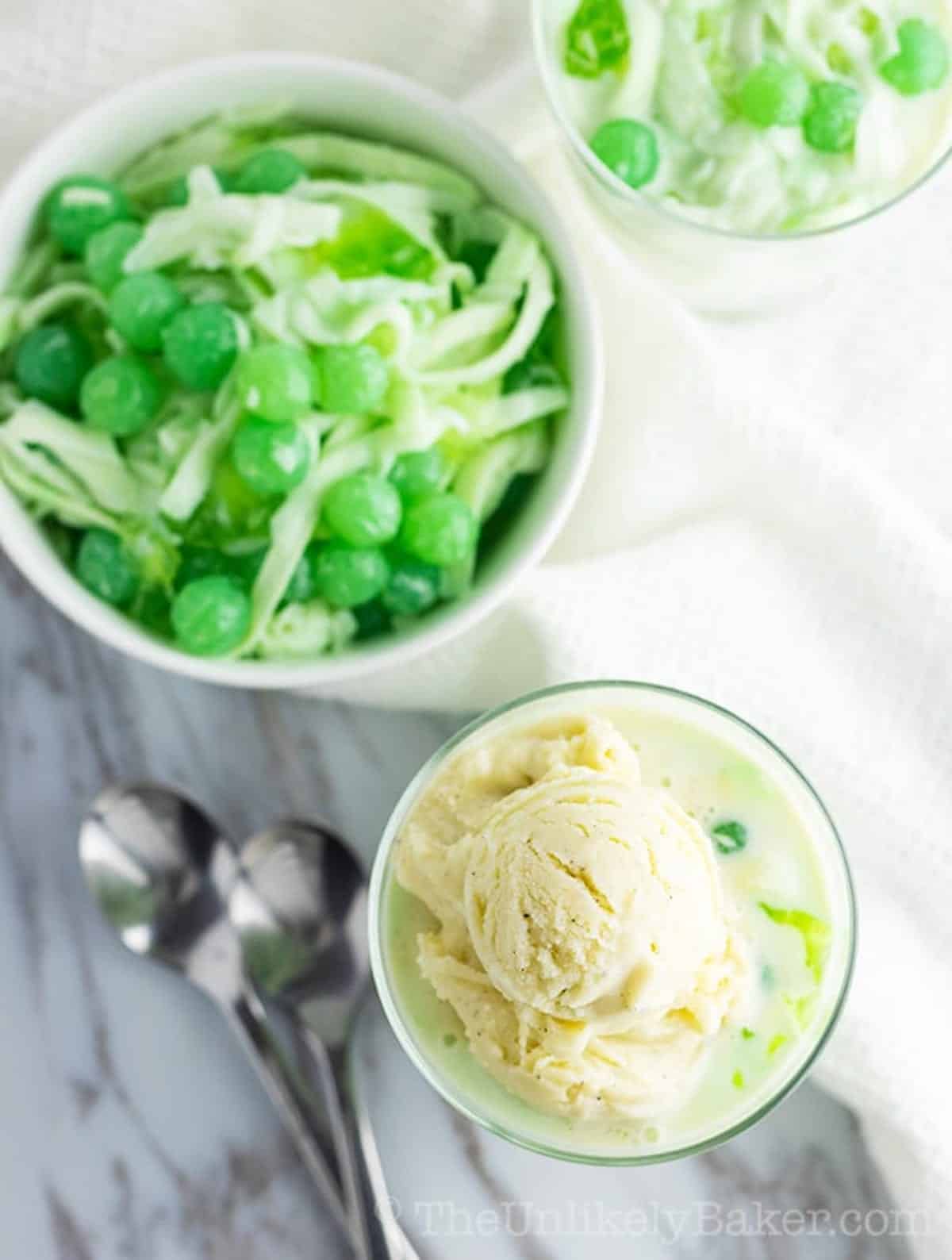 A bowl of Buko Pandan next to ice cream.