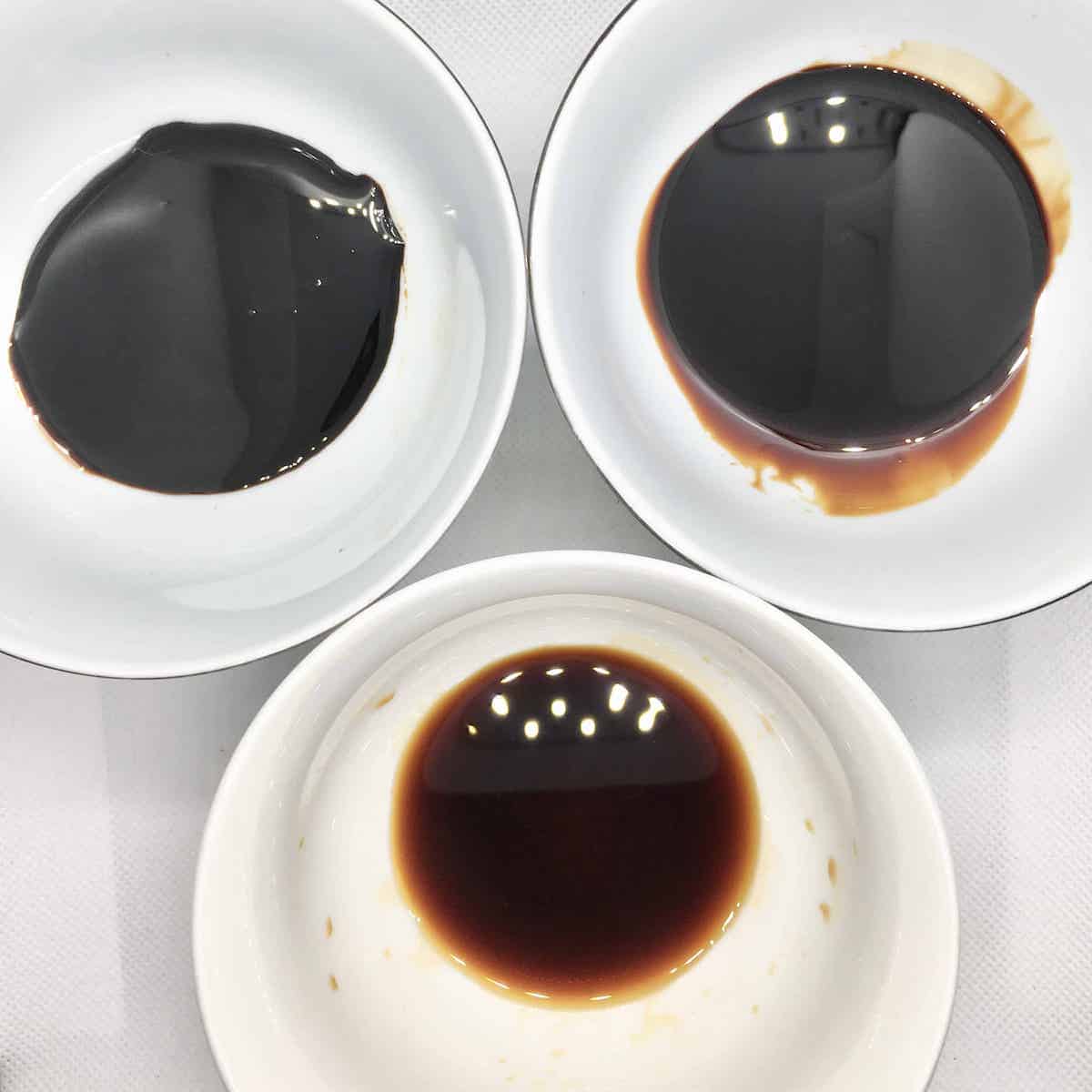 3 bowls of different Chinese soy sauces.