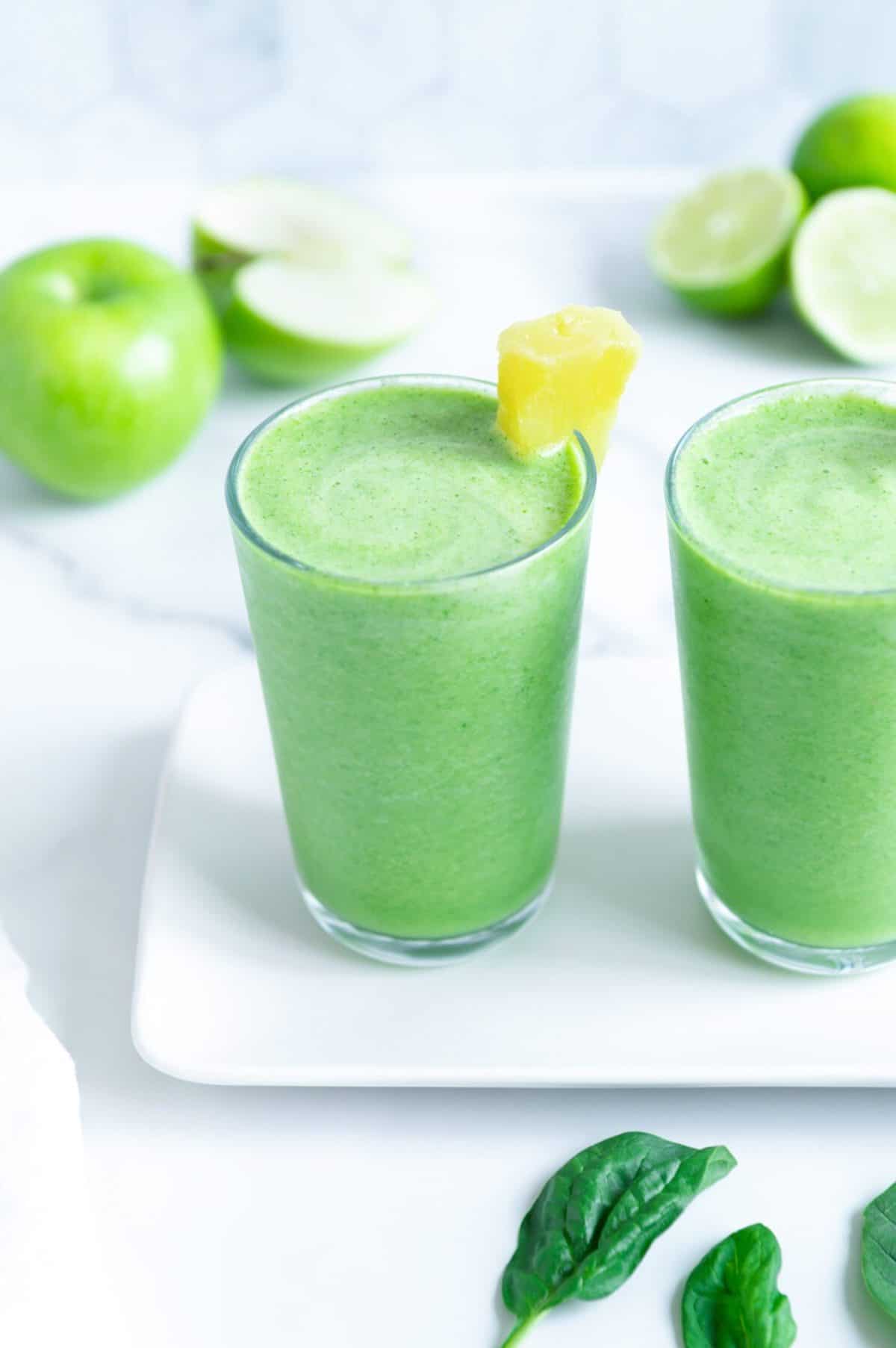 2 cups of bright green smoothies.