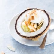 Ice cream in a coconut shell.